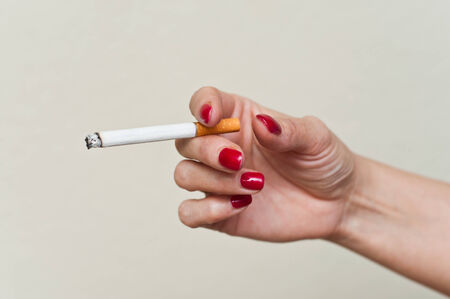 woman hand with cigaretteの写真素材