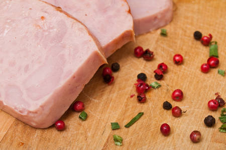 roasted turkey sliced on wooden backgroundの写真素材