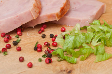 roasted turkey sliced on wooden backgroundの写真素材