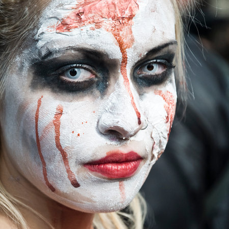 Paris, France - November 16, 2010: People dressed as a zombie parades on a street during a zombie walk in Paris.のeditorial素材