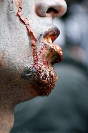 Paris, France - November 16, 2010: People dressed as a zombie parades on a street during a zombie walk in Paris.のeditorial素材