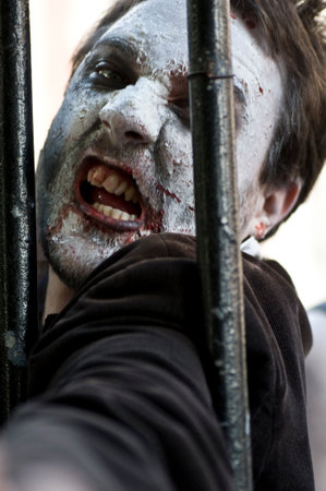 Paris, France - November 16, 2010: People dressed as a zombie parades on a street during a zombie walk in Paris.のeditorial素材