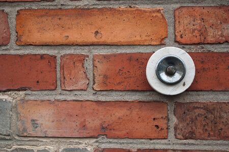 private bell on brick wallの写真素材