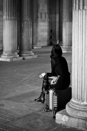 PARIS - France - 24 Septembre 2013 - sexy woman sitting on suitcase
