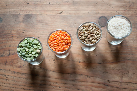 Lentils and split peas on wooden 