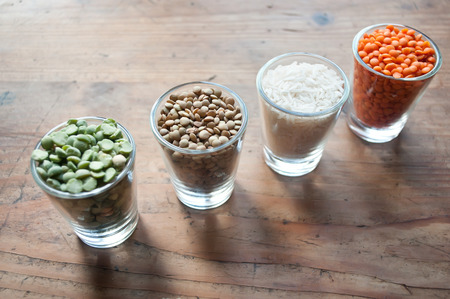 Lentils and split peas on wooden の写真素材