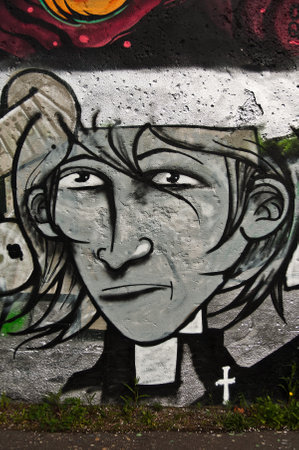 MULHOUSE - France - 18 April 2015 - Graffiti faceのeditorial素材