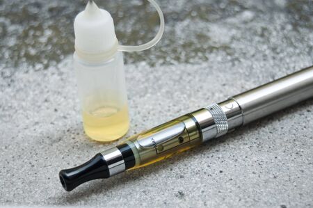 e-cigarette closeup in outdoorの写真素材