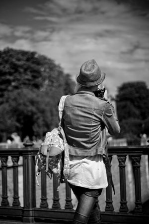 PARIS  France  15 July 2012   tourist with hat take a picture in border seine river in Parisのeditorial素材