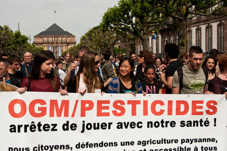 STRASBOURG  France  23 May 2015  people with banner during the demonstration against Monsanto and the transatlantique treated for the production of GMO in Europeのeditorial素材
