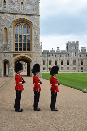 LONDON  ENGLAND JUNE 02 2015 :Buckimgam Palace   The Queen's Guard is the contingents of infantry and cavalry soldiers charged with guarding the official royal residences.のeditorial素材
