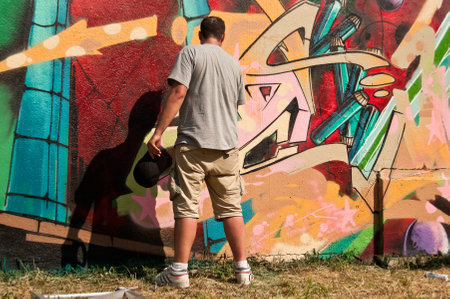 MULHOUSE - France - 07 June 2015 - painter during the BORAR  graffiti festival - quay of sinners in Mulhouseのeditorial素材