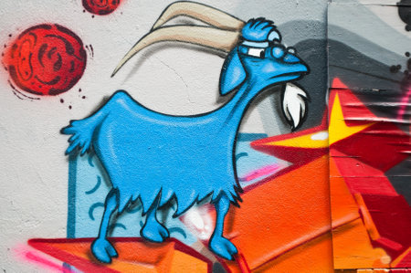 MULHOUSE - France - 08 June 2015 - graffiti of an angry goat during the BOZAR graffiti festival - quay of sinners in Mulhouseのeditorial素材