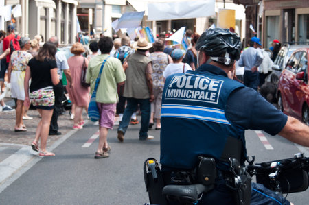 Mulhouse  France  14 june 2015  policeman in bike during the demonstration for peaceのeditorial素材