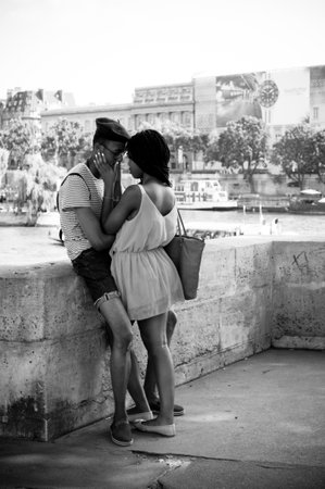 PARIS - France- 20 July 20213 - couple of lovers border seine river in Parisのeditorial素材