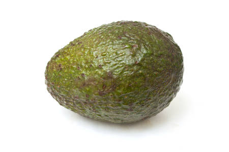 closeup of avocado on white background
