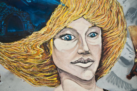 MULHOUSE - France - 08 June 2015 - graffiti of witch during the BOZAR graffiti festival - quay of sinners in Mulhouseのeditorial素材