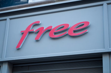 MULHOUSE - France 15 May 2016 - retail of the logo of the brand "Free" the phone operator signageのeditorial素材