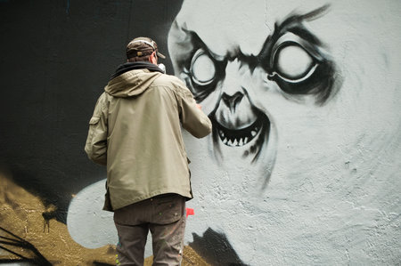 MULHOUSE - France - 20 June 2016 - painter artist during the BOZAR graffiti festival - quay of sinners in Mulhouseのeditorial素材