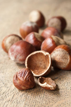 closeup of nuts on wooden background