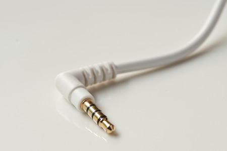 closeup of jack cable on white backgroundの写真素材