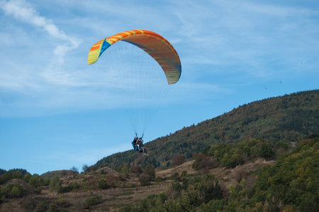 THAN - France - 16 October 2016 - Paraglider  going to land in a fieldのeditorial素材