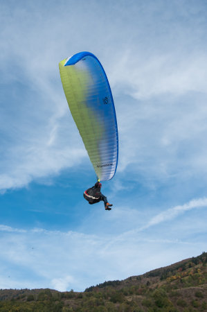 THAN - France - 16 October 2016 - Paraglider  going to land in a fieldのeditorial素材