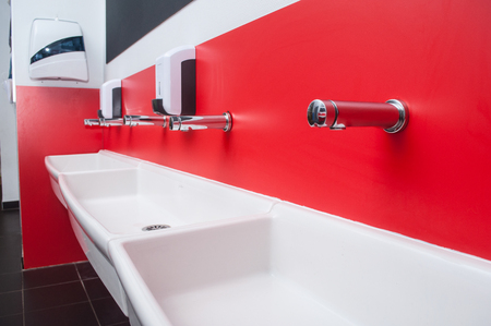 closeup of collective washbasins at nursery schoolの写真素材