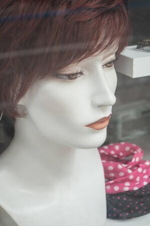 portrait of mannequin in a wig shopの写真素材