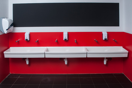 closeup of collective washbasins at nursery schoolの写真素材