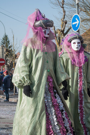 PFASTATT- France - 12 March 2017 - people Parade at the carnival  with Venetian maskのeditorial素材