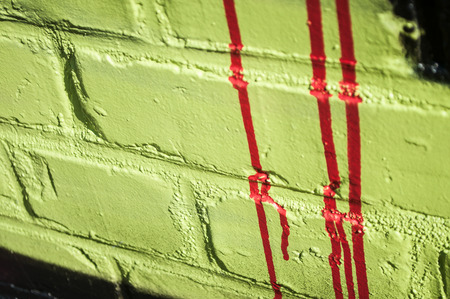 closeup of graffiti texture  on the brick wall in the streetの写真素材