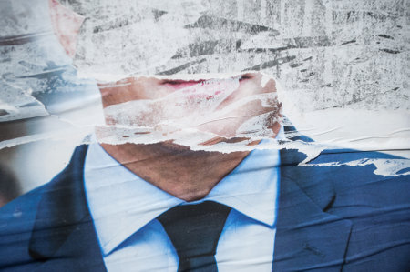 MULHOUSE - France - 24 April 2017 - poster Torn by an angry citizen of the president of "en marche" Political party Qualified the 23 April 2017 For the second  round on 7 May 2017のeditorial素材