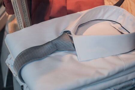 closeup of shirts and ties in a men fashion storeの写真素材
