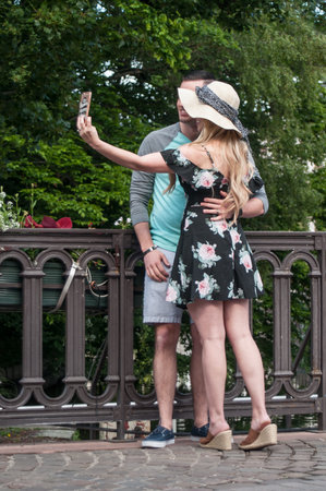 COLMAR - France - 20 May 2017- couple of tourist taking a selfy picture on bridge in little Venise quarter in Colmarのeditorial素材