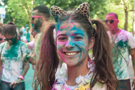 MULHOUSE - France - 4 June 2017 - portrait of woman with smile at Colore Mulhouse 2017, the annual running of five kilometers with colored powder jetsのeditorial素材