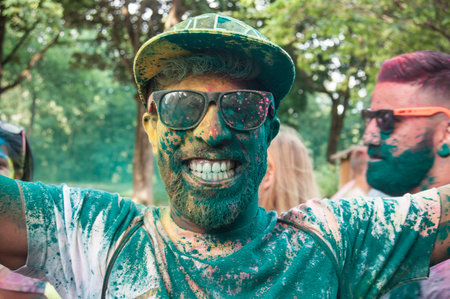 MULHOUSE - France - 4 June 2017 - portrait of man with smile at Colore Mulhouse 2017, the annual running of five kilometers with colored powder jetsのeditorial素材