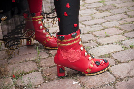 RIQUEWIHR - France - 1 July 2017 - closeup of red shoes of woman at the Venetian Parade in Riquewihr...