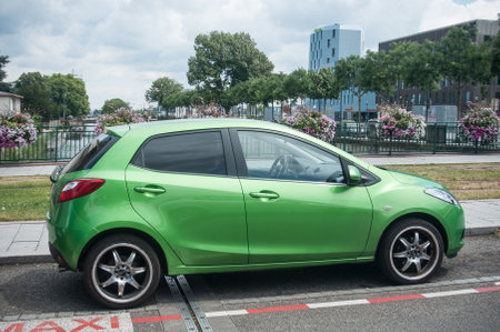 MULHOUSE - France - 2 July 2017 - Green Toyota Yaris parked in the streetのeditorial素材