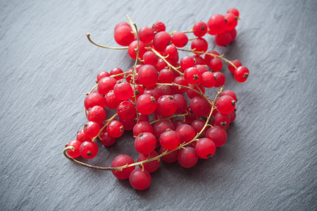closeup of gooseberries  on chalkboard background