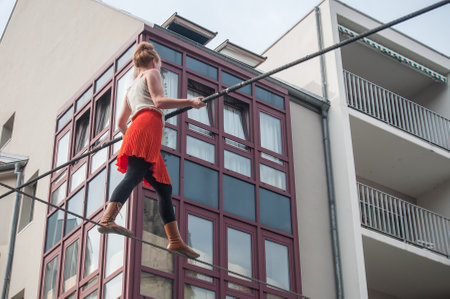 MULHOUSE - France - 15 July 2017 - the artist Johanne Humblet tightrope walker performance during four hours in Mulhouseのeditorial素材