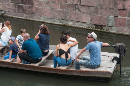 COLMAR - France - 9 August 2017- Boat trip tourism on water at little Venise quarterのeditorial素材