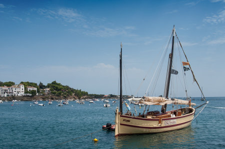 CADAQUES - Spain - 16 August 2017 - Beautiful sailboat moored near the coastのeditorial素材