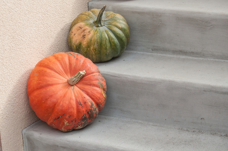 closeup of group of pumpkins in stairs in decoration houseの写真素材