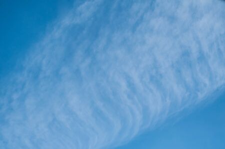 retail of contrail in a blue sky backgroundの写真素材