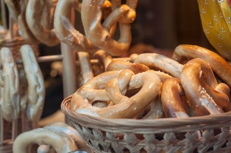 closeup of bretzels in basket in traditional alsatian storeの写真素材