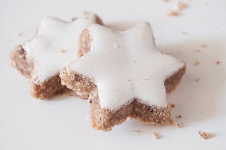 closeup of christmas bakery shaped star on white backgroundの写真素材