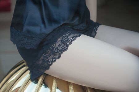 closeup of blue nightie on mannequin in fashion store showroom