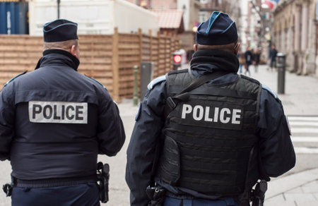 Strasbourg - France - 24 December 2017 - policemen patroling in the street whit shotgunsのeditorial素材