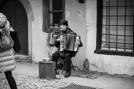 Strasbourg - France - 24 December 2017 - portrait of smiling accordionist playing in the streetのeditorial素材
